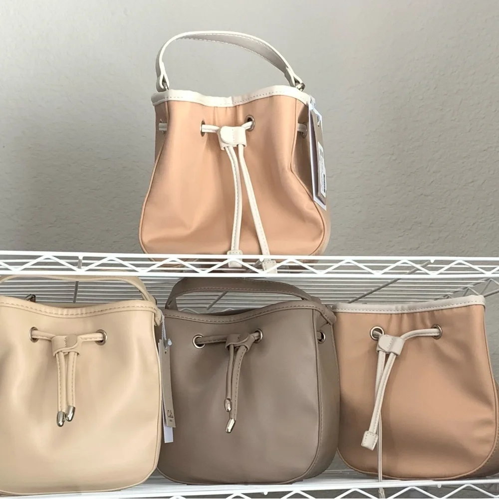 A. Calin Augusta Beige Vegan Leather Bucket Crossbody Bag NWT